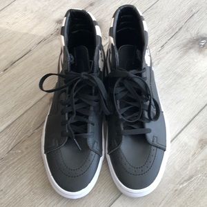 Vans high-tops. NWOT. Men’s 9/Women’s 10.5